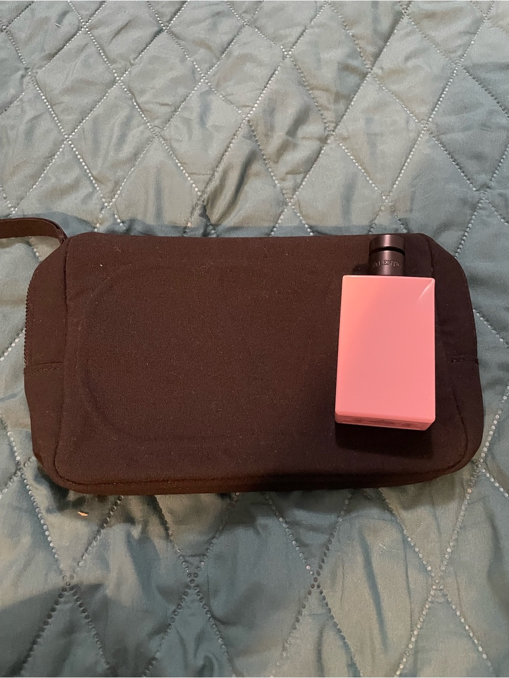 Valentino Black Travel Cosmetic Pouch with Wrist Strap with perfumed lotion